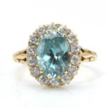 An Edwardian gold blue zircon and diamond cluster ring,