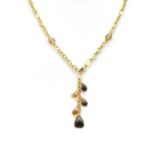 An 18ct gold hollow trace and gemstone 'Y' necklace,