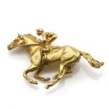 An 18ct gold racehorse brooch, by Harriet Glen,