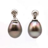 A pair of diamond and pear shaped semi baroque Tahitian cultured pearl drop earrings,