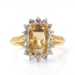 An 18ct two colour gold topaz and diamond cluster ring, by Boodle and Dunthorne, c.1980,