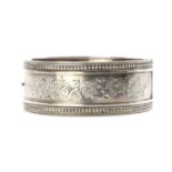 A Victorian sterling silver bangle,