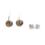 A pair of 18ct gold single stone diamond earrings,