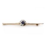 An Edwardian gold sapphire and diamond cluster bar brooch,