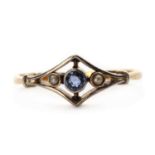 A gold sapphire and split pearl three stone ring,