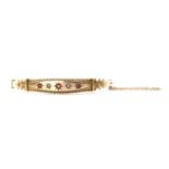 An Edwardian gold doublet and diamond set hollow oval bangle,