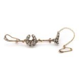 A Victorian gold and diamond set equestrian bar brooch,