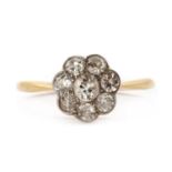 An early 20th century diamond daisy cluster ring,