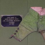 A pair of green silk brocaded trousers,