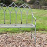 A Gothic-style wrought iron garden seat,