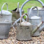 A group of galvanised garden items,