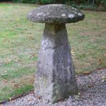 A tall Cotswold stone staddle stone,