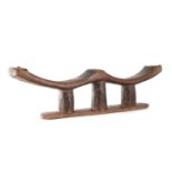 A Kuba People carved softwood double headrest,