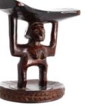 A Luba-Hemba carved wood headrest,