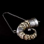A Spanish colonial armadillo tail shot flask,