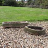 Two stone troughs,