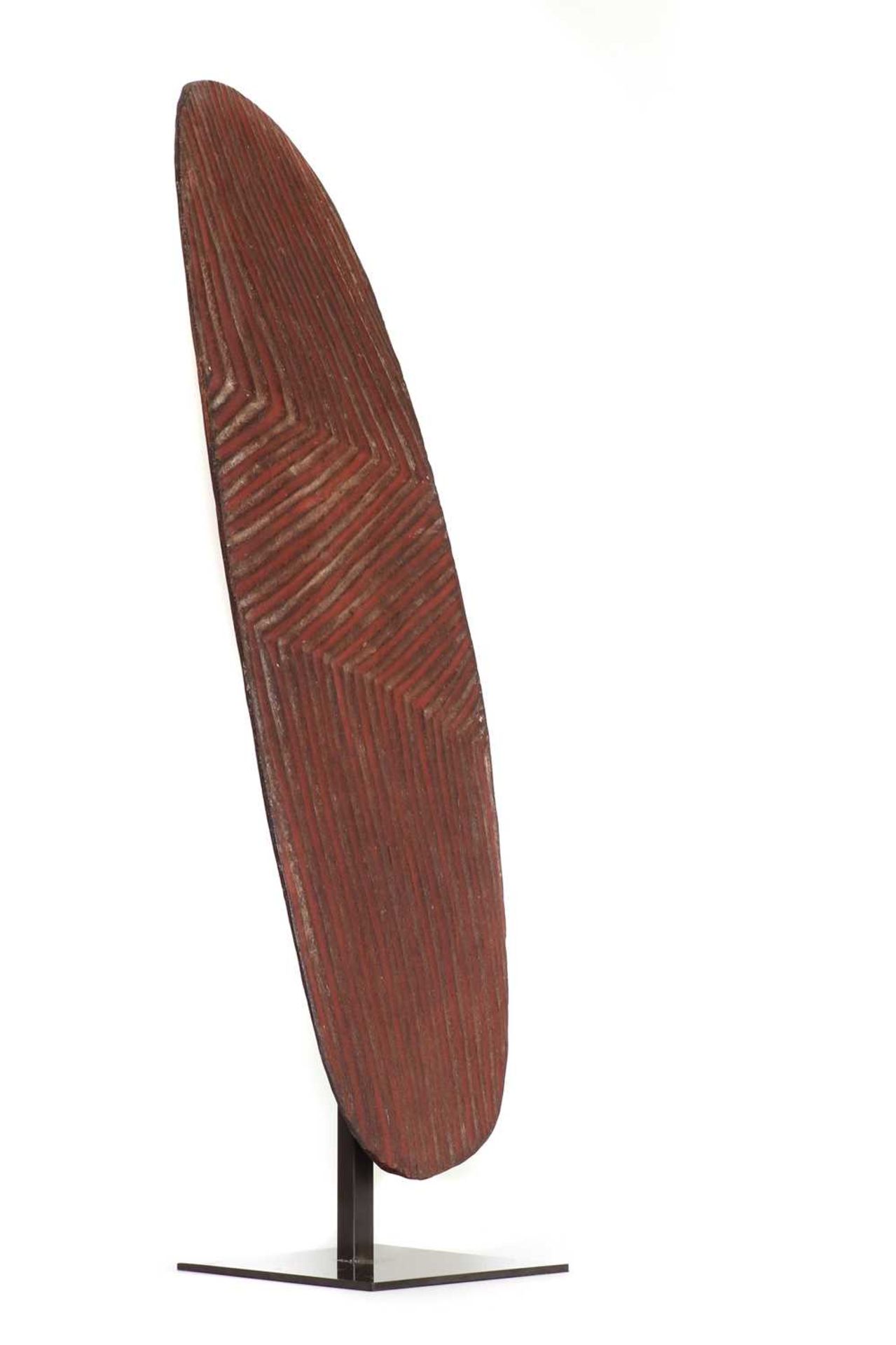 An Aboriginal stone-carved wooden shield or 'wunda',