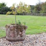 A large limestone open mortar,