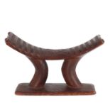 A Kuba carved wood headrest,
