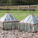 A pair of iron and glass lantern cloches,