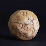 A rare carved walrus ivory teetotum ball,