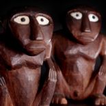 A rare pair of carved wooden idols,