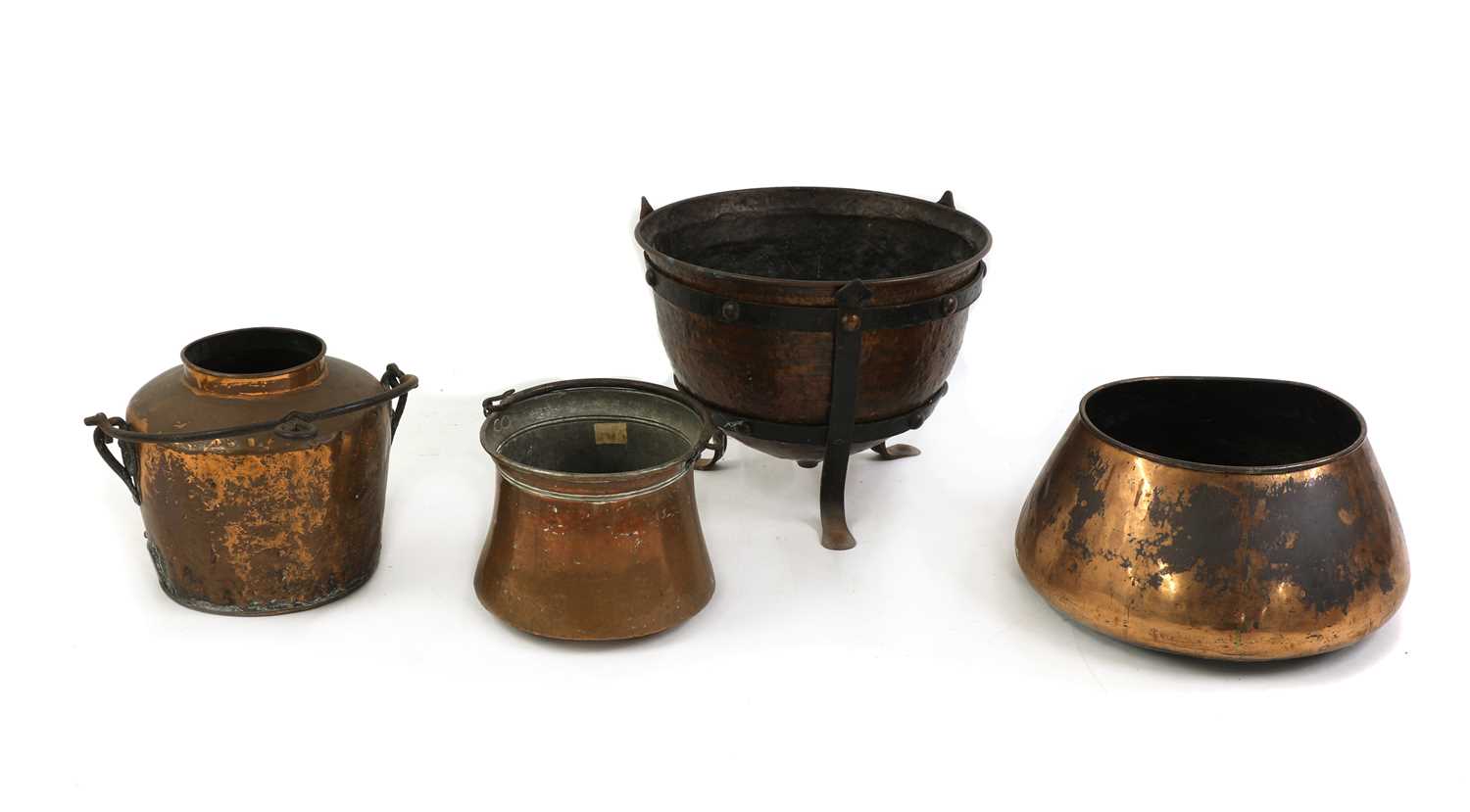 A group of copper fire side bins