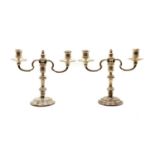 A pair of silver candelabra