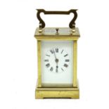 A brass case carriage clock