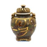 A Japanese Satsuma ware urn and cover,