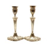 A pair of silver candlesticks