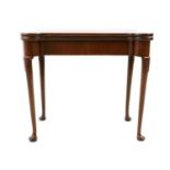 A George II style walnut and mahogany card table