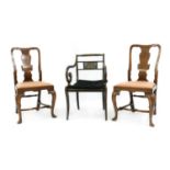 A Regency ebonised, gilt heightened and painted elbow chair,