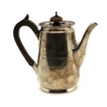 A silver hot water pot