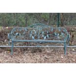 A pair of wrought iron and steel garden benches