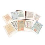 A collection of old bonds and shares certificates