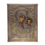 A Russian Orthodox silver gilt mounted Icon,