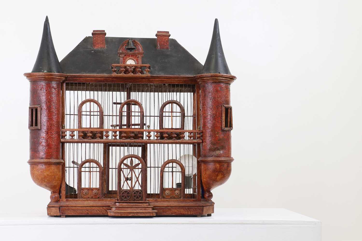 A large painted birdcage,