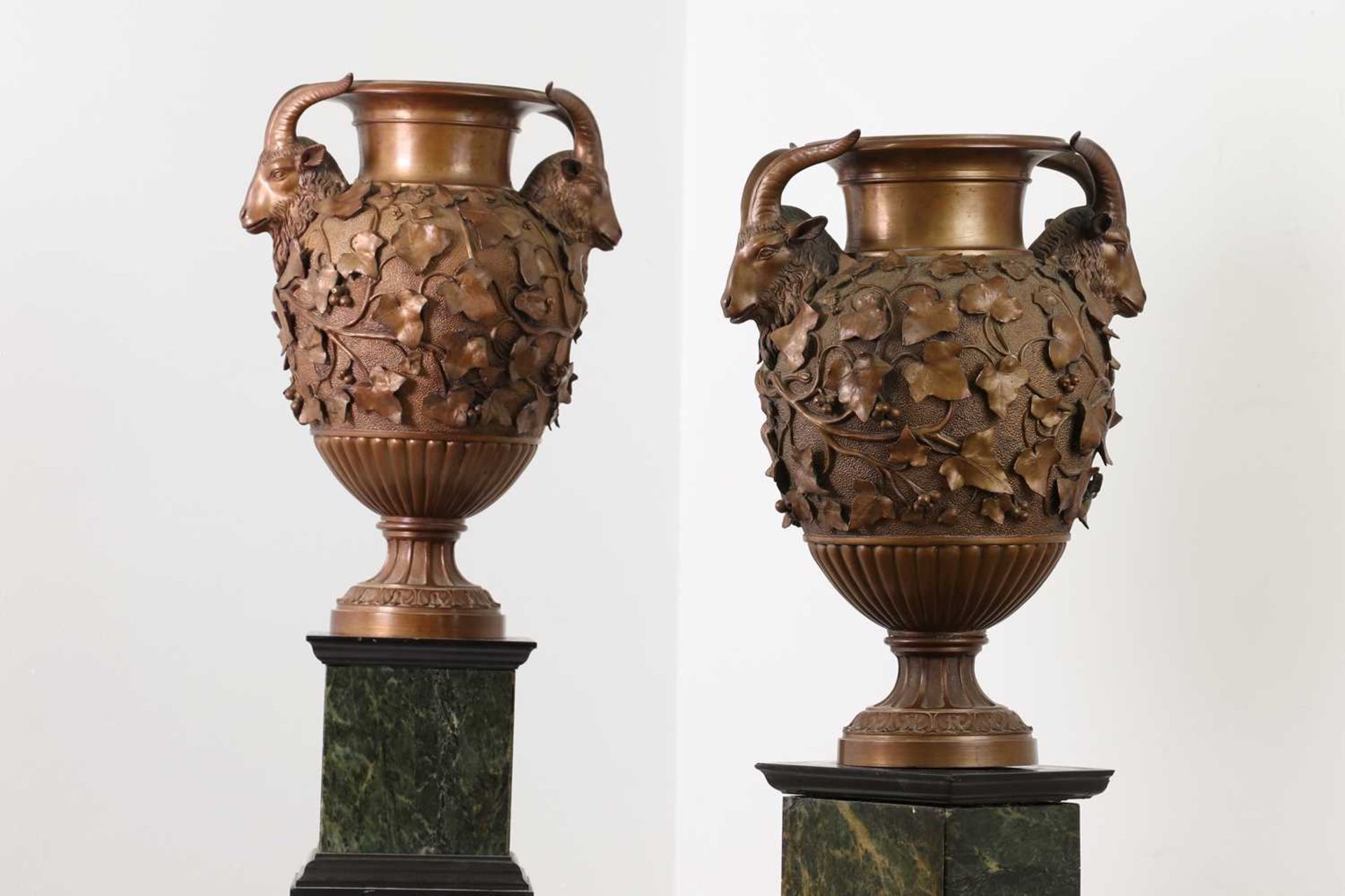 A pair of Grand Tour bronze urns by the workshop of Benedetto Boschetti