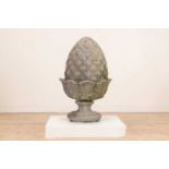 A composition stone pineapple finial,