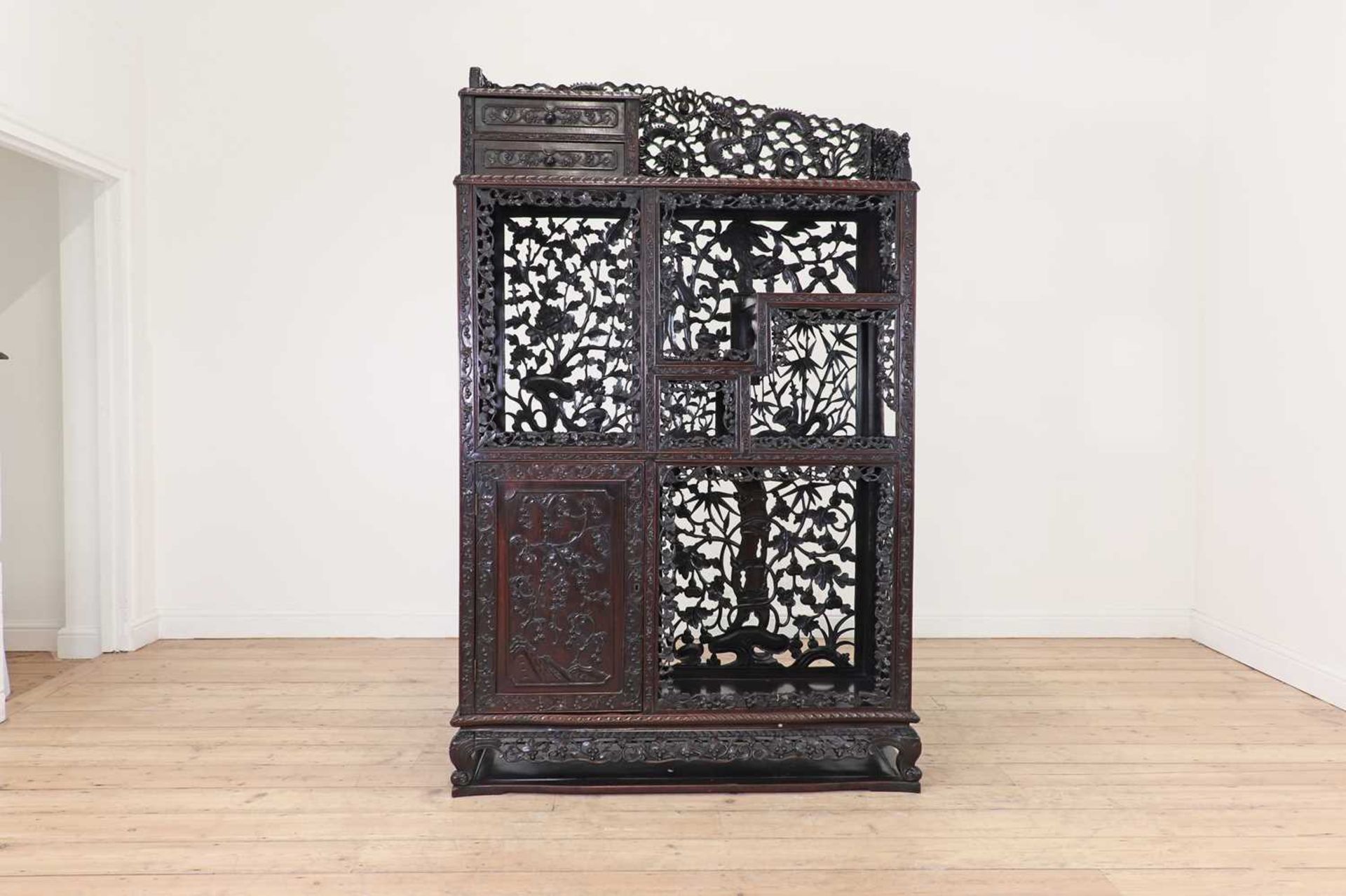 A carved and pierced hardwood cabinet, - Image 2 of 33