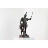 A patinated bronze figure,