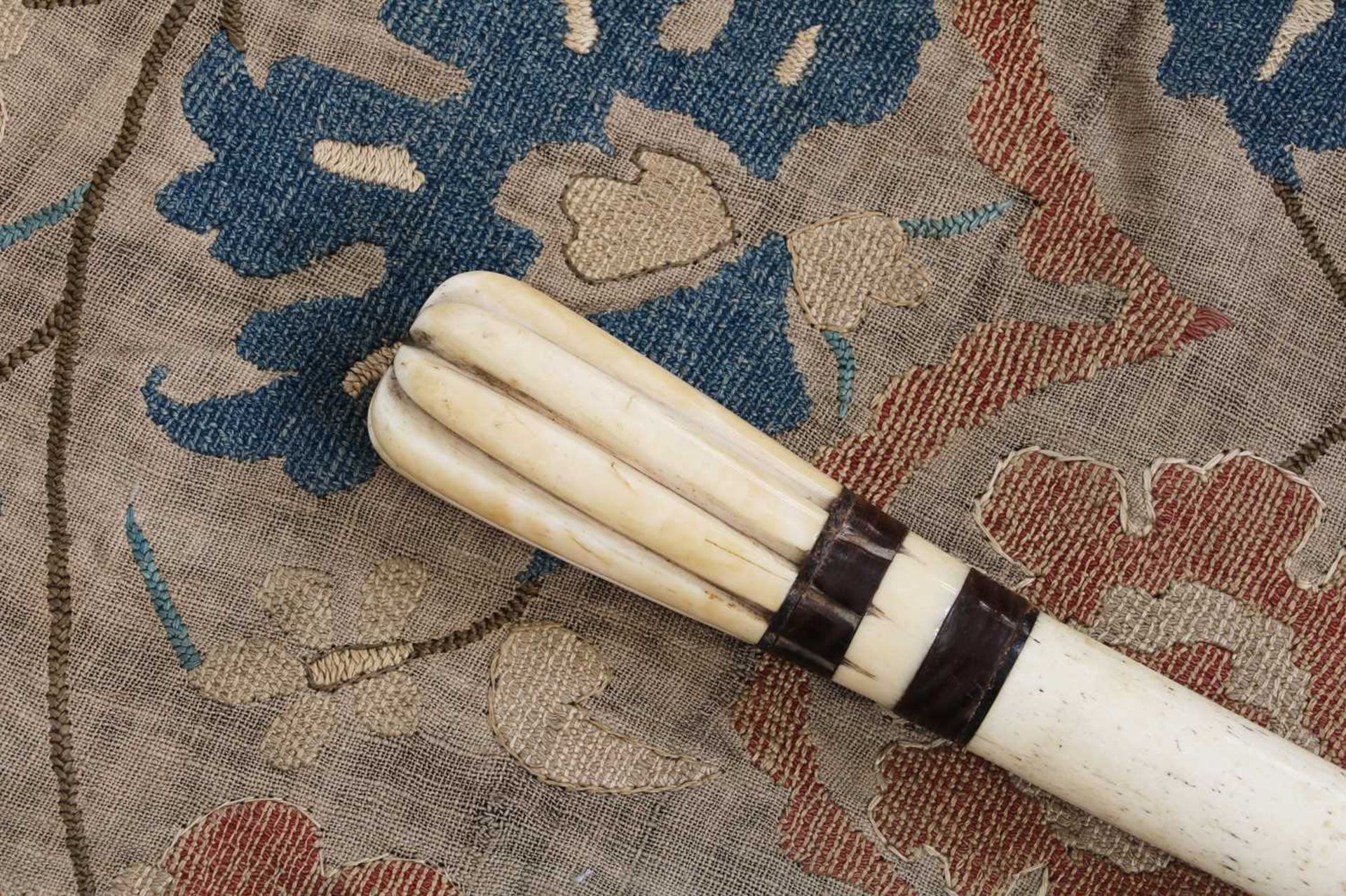 A marine ivory and inlaid walking stick,
