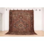 A Persian Heriz wool carpet,