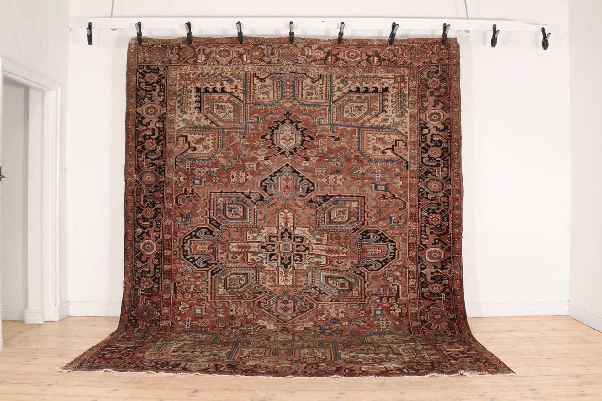 A Persian Heriz wool carpet,