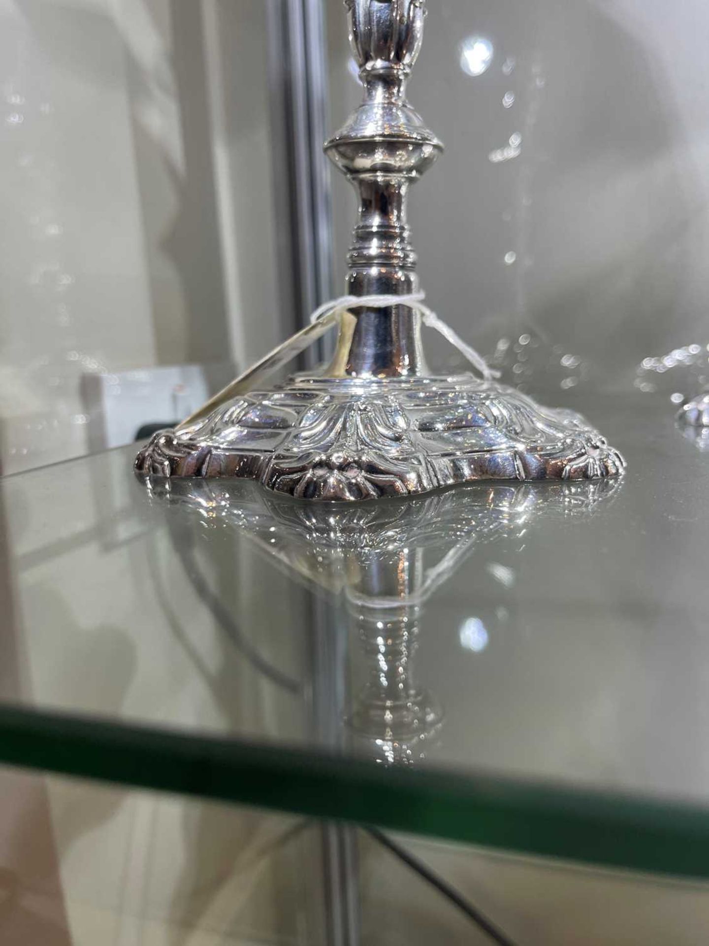 A pair of George II silver table candlesticks, - Image 2 of 39