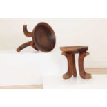A graduated pair of hardwood tripod stools,