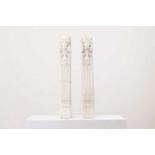 A pair of white marble jambs,