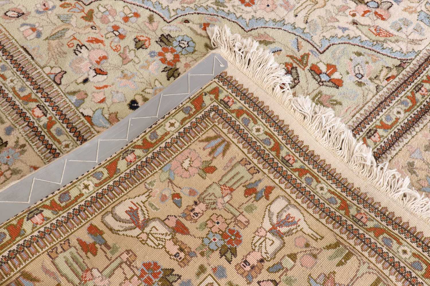 A Persian wool carpet, - Image 4 of 4