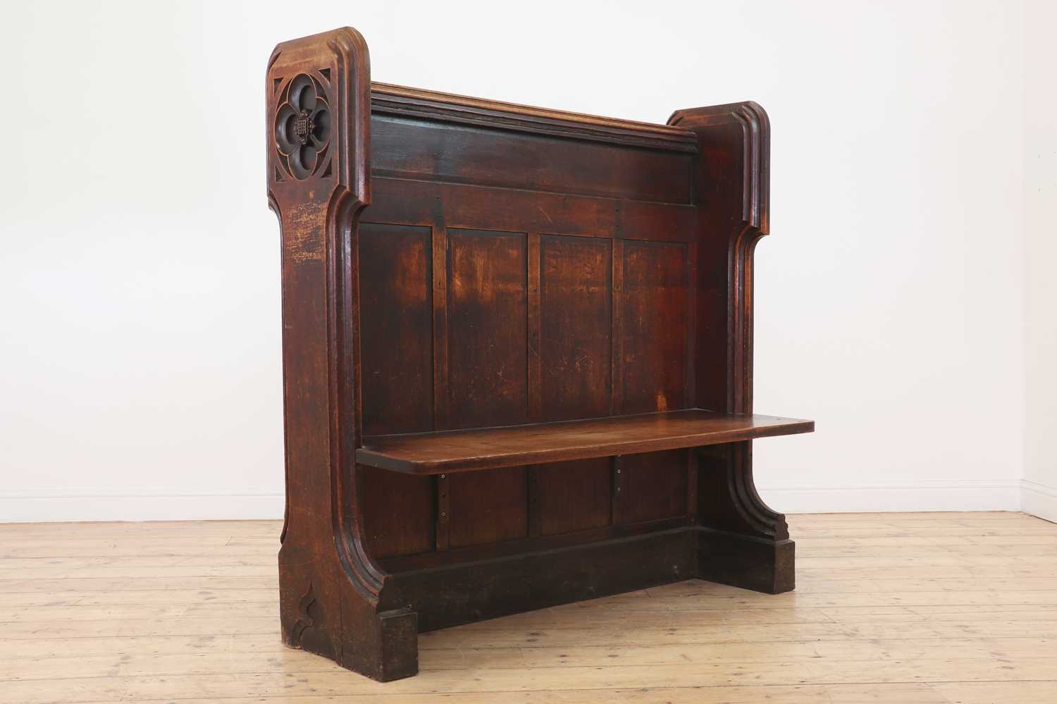 A Victorian Gothic Revival oak pew,